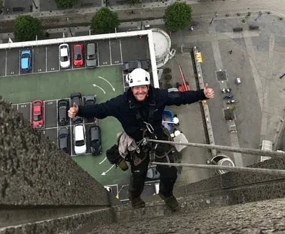 image of hilo staff using rope access for commercial window cleaning